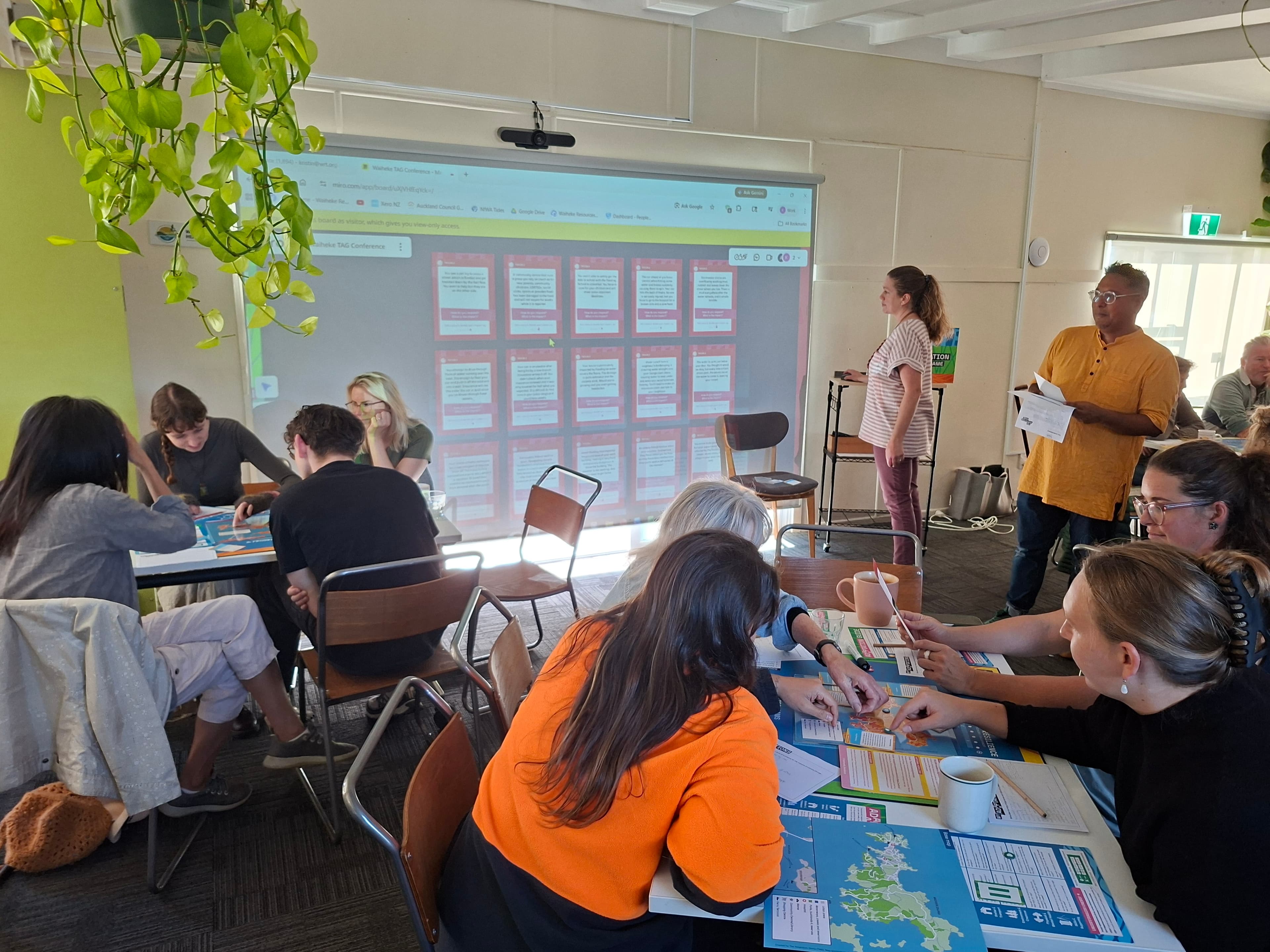 Audience engaged in a workshop presentation